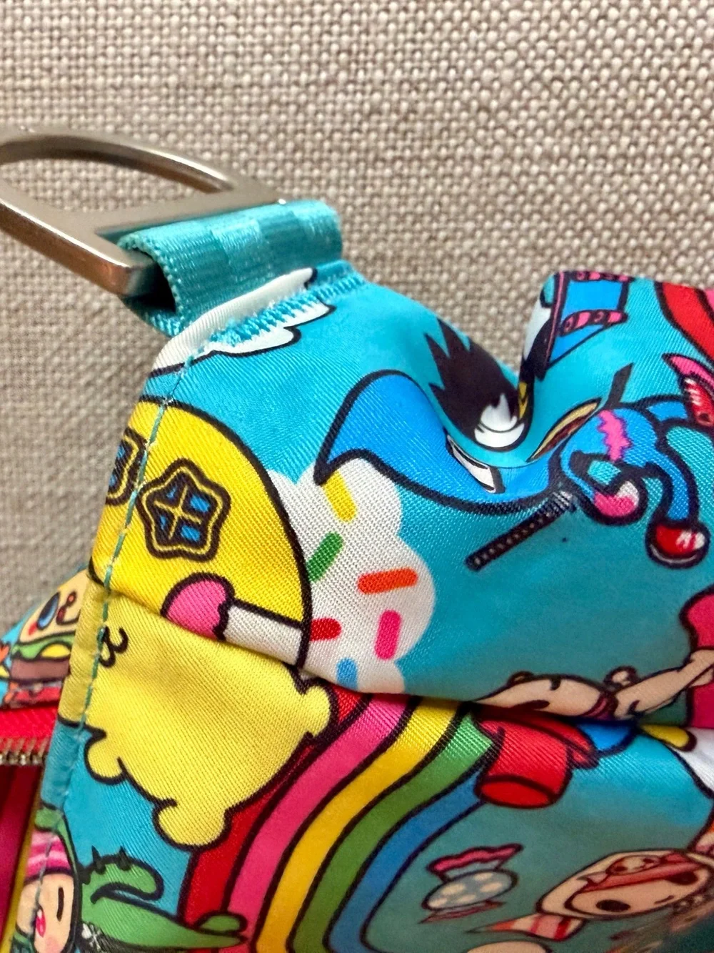 tokidoki x Hello Sanrio for JujuBe Baby Backpack - Bright Blue Rainbow Print